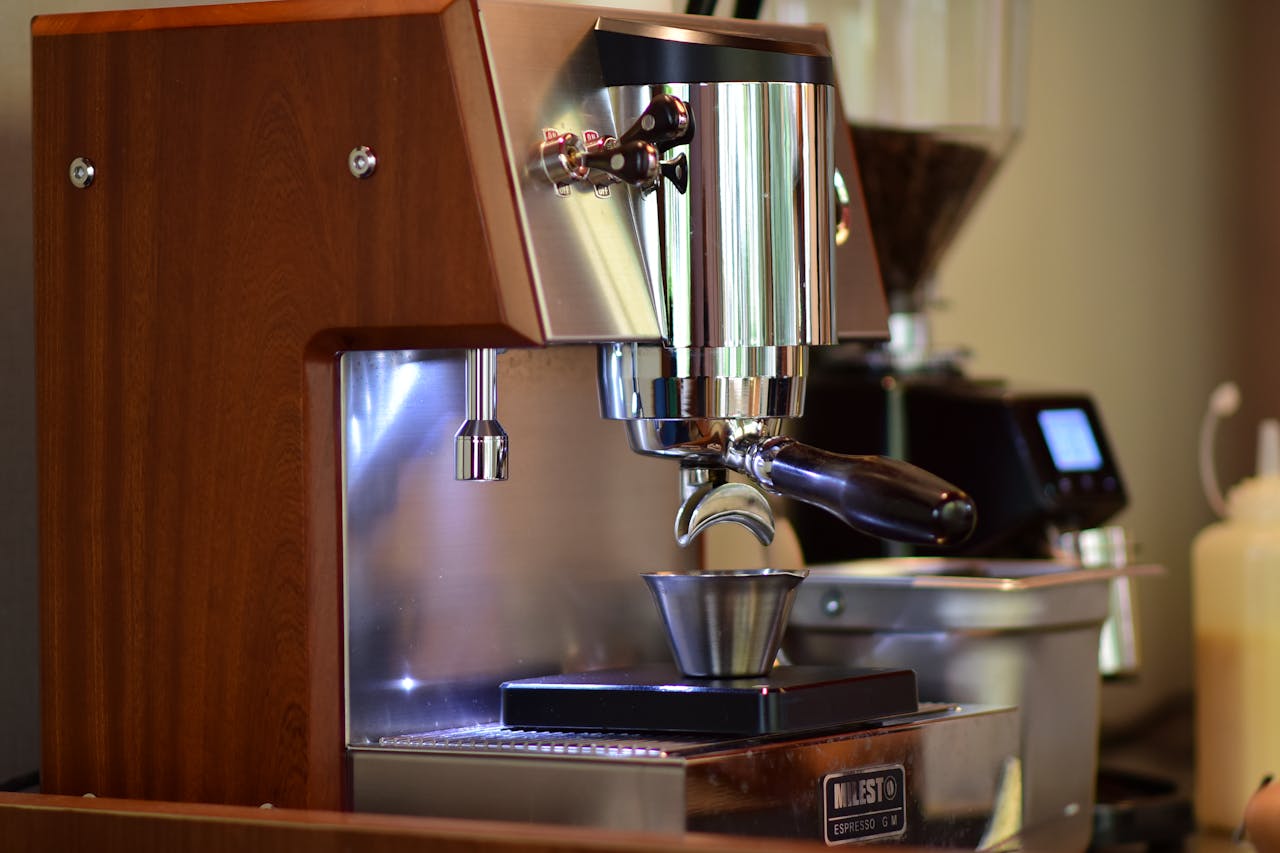 Close-up view of a stylish espresso machine in a contemporary cafe environment. Perfect for coffee enthusiasts.